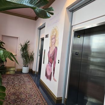 White Limozeen - Dolly Parton greeting you as you go back down - Cocktail Bars Near Me - Nashville, Tennessee