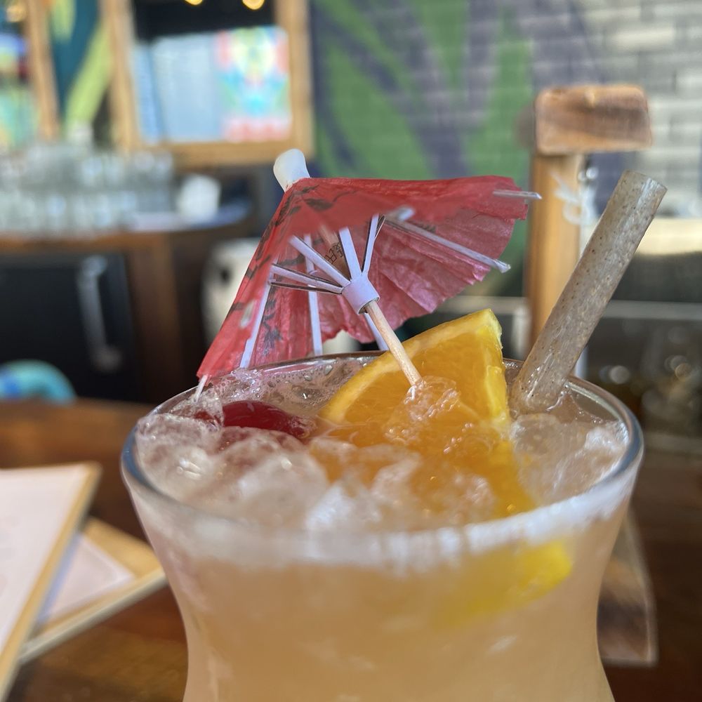 Bar Kapu - hurricane - blended rum, dry curaco, orange, lime, passion fruit, grenadine - Just enough for some fun - Cocktail Bars Near Me - Bentonville, Arkansas