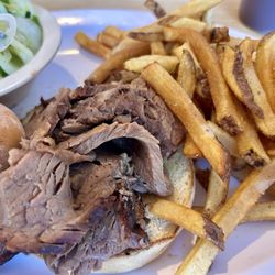 Pig Out Bbq & Southern Soul Food - Brisket sandwich with french fries and cucumber salad