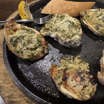 River Rouge Kitchen & Bar - Oysters Rockefeller (1/2 eaten). They were really good. - Wine Bars Near Me - Baton Rouge, Louisiana River Rouge Kitchen & Bar - Oysters Rockefeller (1/2 eaten). They were really good. - Wine Bars Near Me - Baton Rouge, Louisiana