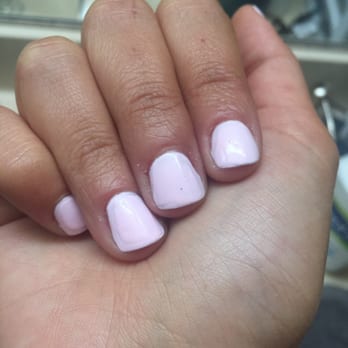 My Nails Place - This is after they tried to "fix" her nails. You can see the 5 different layers of polish - Nail Salons Near Me - Redondo Beach, California