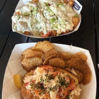 Olcott Lobster - Connecticut Style Lobster Roll with Old Bay Chips along with a side of Lobster tots. - Seafood Near Me - Lewiston, New York