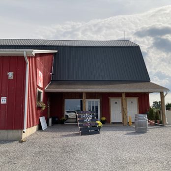 Between the Lines Winery - a red barn with a black roof - Wineries Near Me - Niagara-on-the-Lake, Ontario Between the Lines Winery - a red barn with a black roof - Wineries Near Me - Niagara-on-the-Lake, Ontario