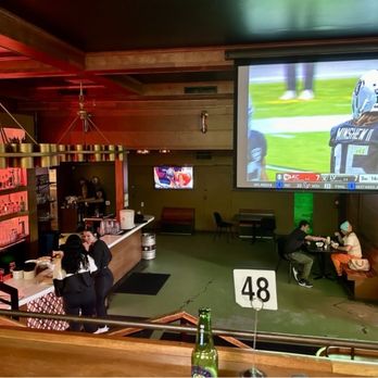 Jackie’s - Looking at the bar from up on the bleacher seating in the main room - Sports Bars Near Me - Portland, Oregon Jackie’s - Looking at the bar from up on the bleacher seating in the main room - Sports Bars Near Me - Portland, Oregon