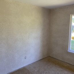 This room was mudded on all walls and shot with texture in a knockdown style This room was mudded on all walls and shot with texture in a knockdown style