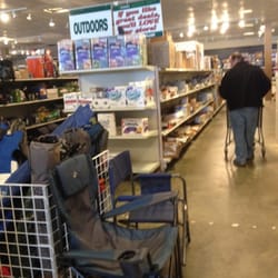 Bargain Hunt - Enormous store: clothing, luggage, housewares, appliances including televisions, furniture, and endless rows of random items.