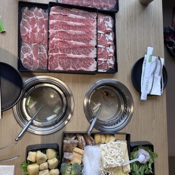 Mumu Hot Pot - The classic combo with 2xsoup base, 2xmeats, 2xsides, undon noodles and a large veggie plate. Extra tofu, shrimp paste, tongue slices - Hot Pot Near Me - Torrance, California Mumu Hot Pot - The classic combo with 2xsoup base, 2xmeats, 2xsides, undon noodles and a large veggie plate. Extra tofu, shrimp paste, tongue slices - Hot Pot Near Me - Torrance, California