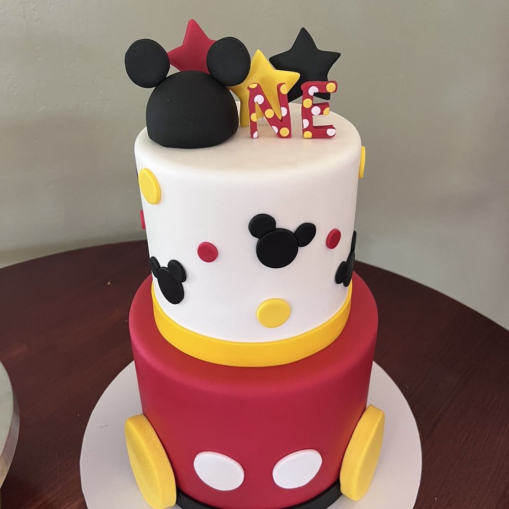 Marvel Cake - Mickey Mouse birthday cake. Chocolate top, vanilla bottom, fondant outer covering. - Bakeries Near Me - Campbell, California Marvel Cake - Mickey Mouse birthday cake. Chocolate top, vanilla bottom, fondant outer covering. - Bakeries Near Me - Campbell, California