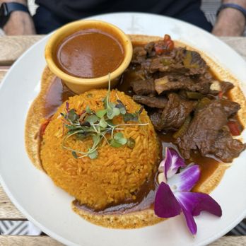 Santiago's Garden - My friend had rice and beef stew ( Carne Quisada ) - Dominican Near Me - New York, New York Santiago's Garden - My friend had rice and beef stew ( Carne Quisada ) - Dominican Near Me - New York, New York