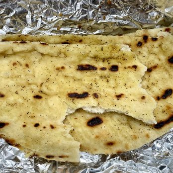 Mazevo Mediterranean Eatery - Side pita (curry flavored) - Mediterranean Near Me - Denver, Colorado Mazevo Mediterranean Eatery - Side pita (curry flavored) - Mediterranean Near Me - Denver, Colorado