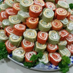 Ella's Dela Delicatessen - Pin rolls, with mixed cheese and mixed me what's a cream cheese filling. Call need an event catered? 920-457-3034, ask for Walter