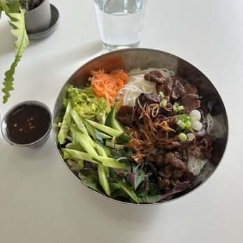 Sesame Dinette - Noodle Salad Bowl (bu'n) Vermicelli noodles, fresh greens, fish sauce vinaigrette and grilled pork $14 - Vietnamese Near Me - Long Beach, California Sesame Dinette - Noodle Salad Bowl (bu'n) Vermicelli noodles, fresh greens, fish sauce vinaigrette and grilled pork $14 - Vietnamese Near Me - Long Beach, California