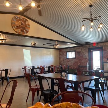 C J's Pizza - a dining room with tables and chairs - Chicken Wings Near Me - Clayton, Indiana