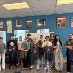 Seattle Youth Symphony Orchestra staff and summer interns getting CPR certified