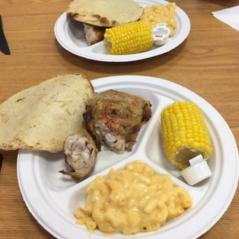 Basil's Flame Broiled Chicken & Ribs - Lunch Special - Thigh and Leg plus two sides and some Pita Bread with some tasty sweet butter! - New American Near Me - Bradenton, Florida