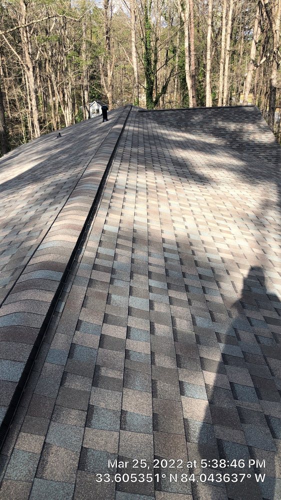 Slide of Rapid Roofers