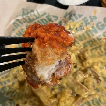 Wingstop - Unacceptably dry. You should not see dry patches like this. It was also lukewarm. - Chicken Wings Near Me - New York, New York