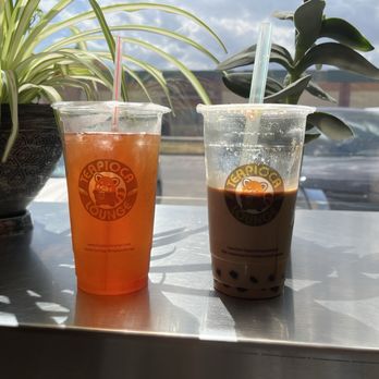 Teapioca Lounge - Left: strawberry green tea Right: red panda brown sugar milk tea with tapioca - Coffee & Tea Near Me - Oklahoma City, Oklahoma Teapioca Lounge - Left: strawberry green tea Right: red panda brown sugar milk tea with tapioca - Coffee & Tea Near Me - Oklahoma City, Oklahoma