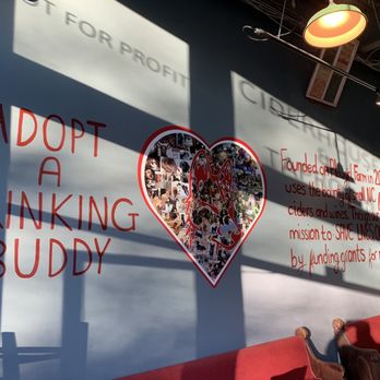 Dingo Dog Brewing Company - a heart - shaped sign on the wall - Community Service/Non-Profit Near Me - Carrboro, North Carolina