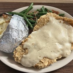 Hermann Sons Steakhouse - Chicken Fried steak huge and delicious! Full of flavor not too salty.