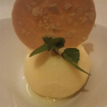 Ocean Prime - Passionfruit sorbet with almond cookie - Seafood Near Me - Beverly Hills, California Ocean Prime - Passionfruit sorbet with almond cookie - Seafood Near Me - Beverly Hills, California
