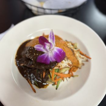La Diosa de Los Moles - Mole poblano and mole rojo over chicken breast, rice and julienne veggies. - Mexican Near Me - Monterey Park, California La Diosa de Los Moles - Mole poblano and mole rojo over chicken breast, rice and julienne veggies. - Mexican Near Me - Monterey Park, California