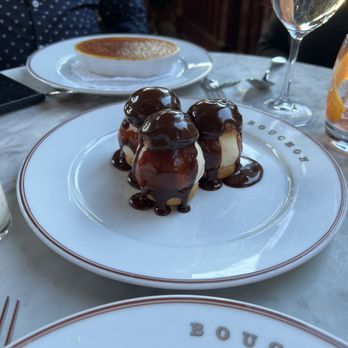 Bouchon - Profitéroles filled with ice cream and served with hot fudge - French Near Me - Yountville, California Bouchon - Profitéroles filled with ice cream and served with hot fudge - French Near Me - Yountville, California