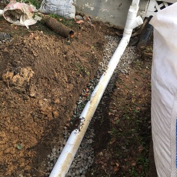 All About Landscaping - Underground extension to the downspout - Landscaping Near Me - Fairfax, Virginia