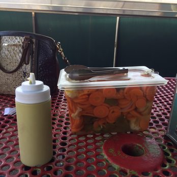 Cilantro Taco Grill - Stone Park - The huge container of jalapeño/carrot condiments. - Mexican Near Me - Stone Park, Illinois