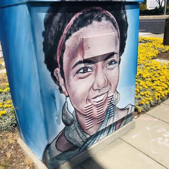 Smiling Woman Art - Smiling face beaming at traffic. - Public Art Near Me - Hayward, California Smiling Woman Art - Smiling face beaming at traffic. - Public Art Near Me - Hayward, California