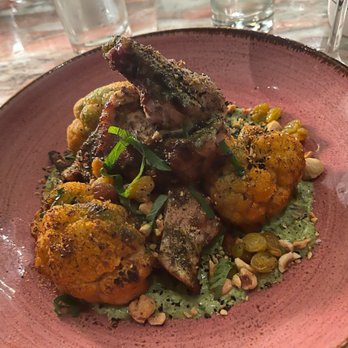 Sister Restaurant - MOROCCAN SPICED CHICKEN MINT TAHINI, CAULIFLOWER, PICKLED RAISINS, HAZELNUTS $32 - Italian Near Me - Dallas, Texas Sister Restaurant - MOROCCAN SPICED CHICKEN MINT TAHINI, CAULIFLOWER, PICKLED RAISINS, HAZELNUTS $32 - Italian Near Me - Dallas, Texas