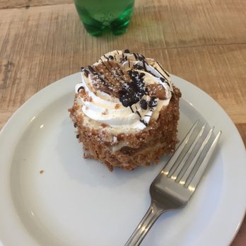 Bémol & Levain - a piece of cake on a plate with a fork - Coffee & Tea Near Me - Montreal, Quebec Bémol & Levain - a piece of cake on a plate with a fork - Coffee & Tea Near Me - Montreal, Quebec