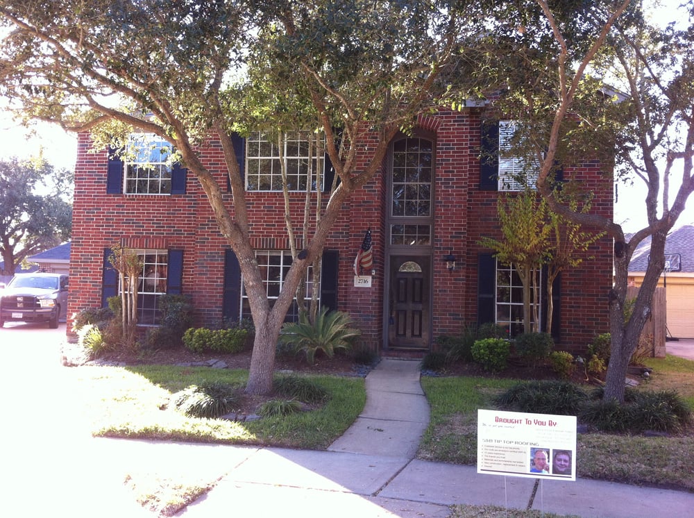 Slide of S&B Tip-Top Roofing