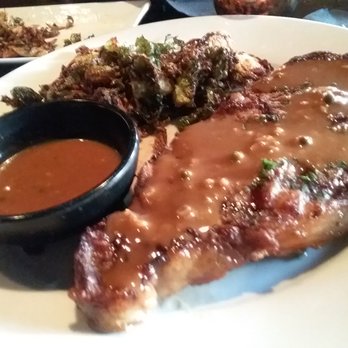 The Blacksmith Restaurant - Rib eye with peppercorn cream sauce & Brussels. - Lounges Near Me - Bend, Oregon The Blacksmith Restaurant - Rib eye with peppercorn cream sauce & Brussels. - Lounges Near Me - Bend, Oregon