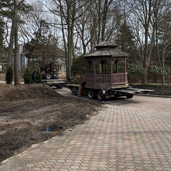 Long Island Shed Builders - a small gazebo in a park - General Contractors Near Me - Smithtown, New York