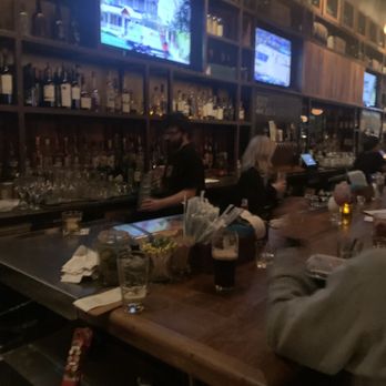 Monument Restaurant & Tavern - a very busy bar with tv's....we watched 2 innings of the Red Sox while waiting - Bars Near Me - Boston, Massachusetts