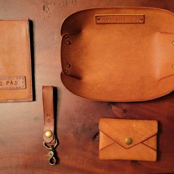 Leather Art Center - 3 items on the right are from the Intro Class. Hand stitched Notepad cover is a separate class.