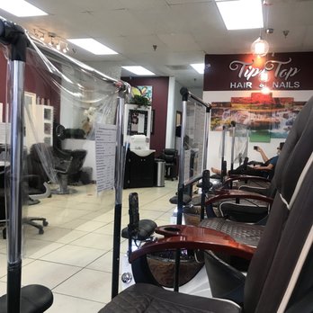 Tip Top Nail Bar - Chairs with protective dividers between client and staff - Nail Salons Near Me - Tustin, California Tip Top Nail Bar - Chairs with protective dividers between client and staff - Nail Salons Near Me - Tustin, California