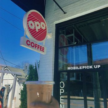 Opo Coffee - Outside plus a decaf oatmilk latte with simple syrup - Coffee Roasteries Near Me - Decatur, Georgia Opo Coffee - Outside plus a decaf oatmilk latte with simple syrup - Coffee Roasteries Near Me - Decatur, Georgia