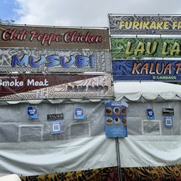 Food stand sign. At least spell "Hawiian" correctly.