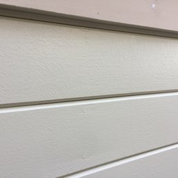 Paint so thick it looks like texture on brand new siding. Cost $4000 to sand and repaint Paint so thick it looks like texture on brand new siding. Cost $4000 to sand and repaint