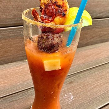 Victorian Cafe - The "Proud Mary"; a tall Bloody Mary with double vodka and skewer of cheese, grilled shrimp & meatball along with olives - Breakfast & Brunch Near Me - Bend, Oregon Victorian Cafe - The "Proud Mary"; a tall Bloody Mary with double vodka and skewer of cheese, grilled shrimp & meatball along with olives - Breakfast & Brunch Near Me - Bend, Oregon