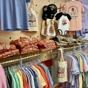 The Chill Spot - Wall of Chill Spot merch. Cute and colorful tees, bags, sweatshirts etc. Reasonably priced. - Ice Cream & Frozen Yogurt Near Me - Corolla, North Carolina The Chill Spot - Wall of Chill Spot merch. Cute and colorful tees, bags, sweatshirts etc. Reasonably priced. - Ice Cream & Frozen Yogurt Near Me - Corolla, North Carolina