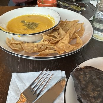 Ursula - chips and queso (half eaten) - New Mexican Cuisine Near Me - Brooklyn, New York