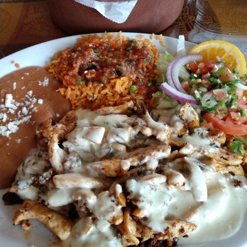 Tequila Jalisco Mexican Restaurant - Pollo Jalisco: chicken, chorizo, and mushrooms with cheese dip on top. - Mexican Near Me - Harvey, Illinois Tequila Jalisco Mexican Restaurant - Pollo Jalisco: chicken, chorizo, and mushrooms with cheese dip on top. - Mexican Near Me - Harvey, Illinois