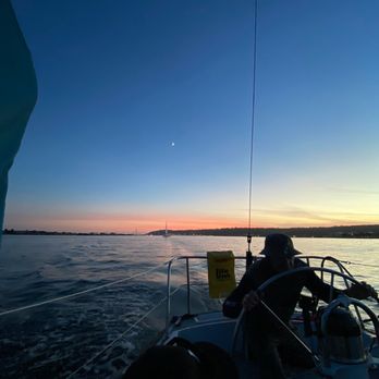 Pacifica Sailing Charters - Captain Mick, beautiful sunset, stern of the boat - Boat Charters Near Me - San Diego, California