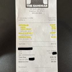 The Sandbar - The actual bill with all the bogus up charges including sour cream and salsa that are clearly listed as ingredients on the menu.