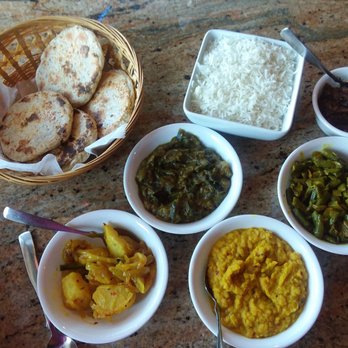 House of Curry - 4 veg curries: eggplant, green beans, yellow dhal (parripou), and potatoes. Pol roti top left, then rice, then lunu miris (sweet onions) - Asian Fusion Near Me - Rosemount, Minnesota House of Curry - 4 veg curries: eggplant, green beans, yellow dhal (parripou), and potatoes. Pol roti top left, then rice, then lunu miris (sweet onions) - Asian Fusion Near Me - Rosemount, Minnesota