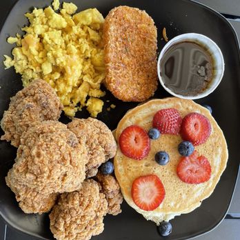 Burgeezy - Brunch platter with eggz and cheez, hashbrowns, fluffy pancakes and fried cauliflower wings. - Vegan Near Me - Indianapolis, Indiana