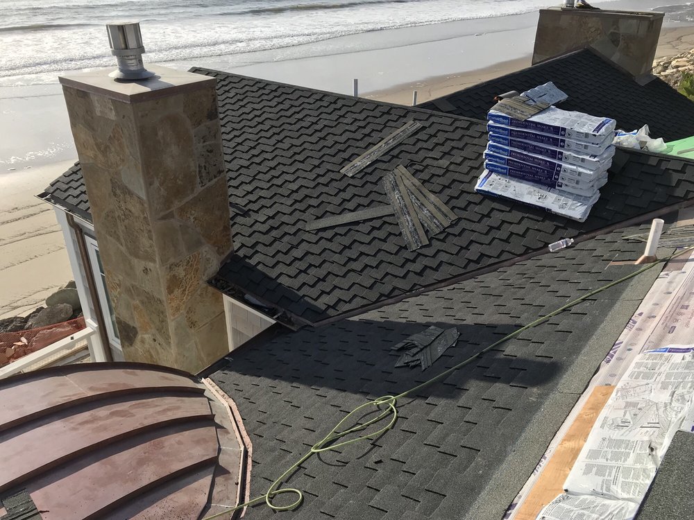 Slide of Aztec Roofing